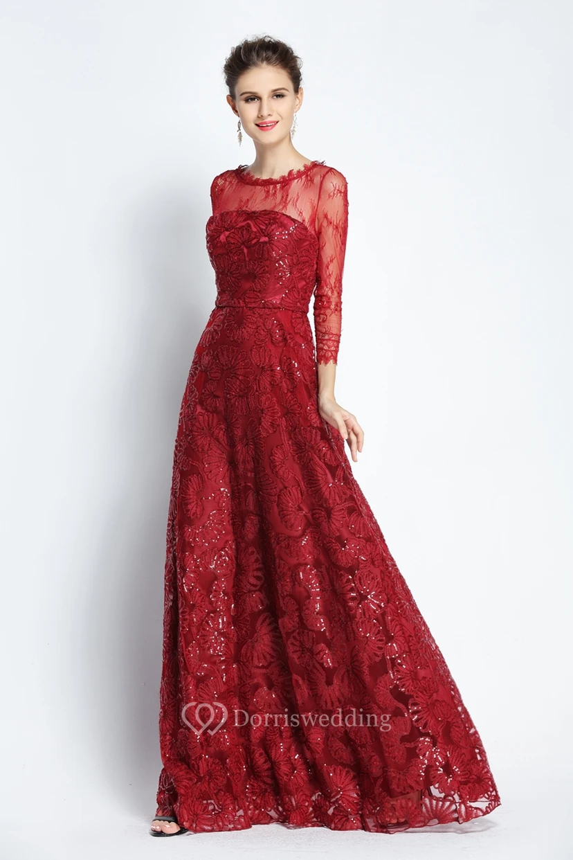 Robe de bal trapèze, longueur au sol, décolleté bateau, manches longues en dentelle festonnée et sequins