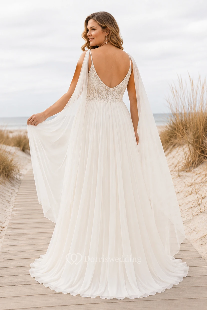 Robe de mariée grande taille ivoire en mousseline de soie à fines bretelles et dos nu, coupe trapèze, dos nu view 2