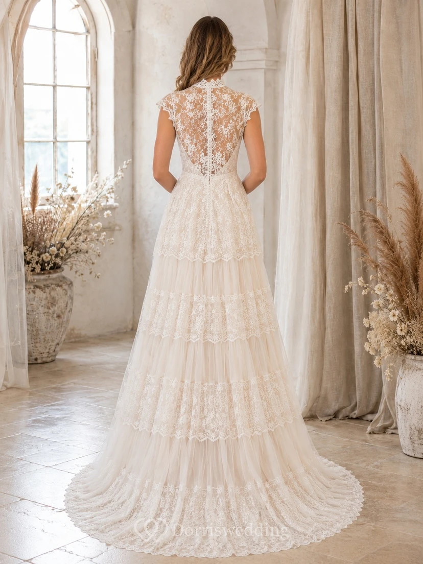 Vestido de novia modesto de manga corta, cuello alto, corte en A, encaje y volantes, color marfil view 2