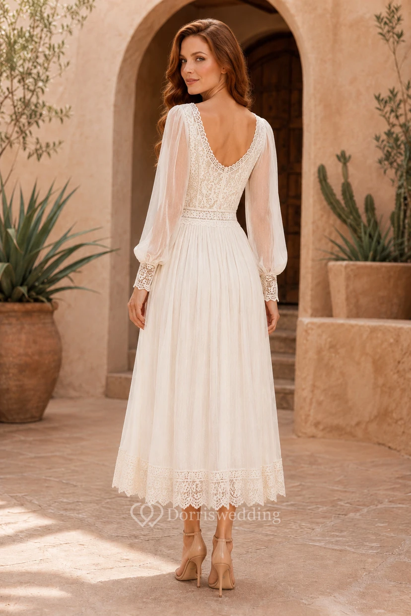 Robe de mariée en dentelle à manches longues, longueur thé, col rond et jupe fluide view 2