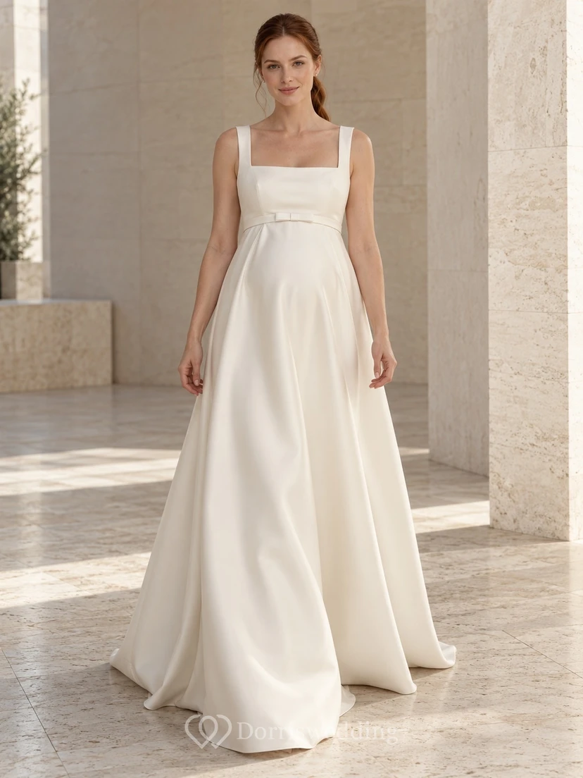 Robe de mariée trapèze en satin, sans manches, col carré et nœud empire, coupe simple.