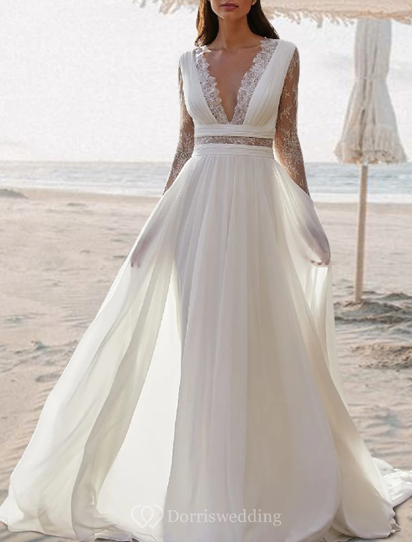 Vestido de novia etéreo de gasa con corte en A y mangas transparentes.