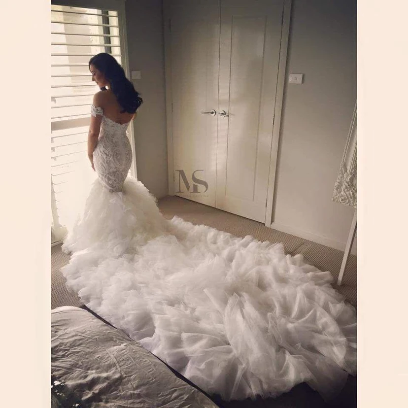 Sexy Off-the-shoulder Mermaid Wedding Dress Long Train With Ruffles view 2
