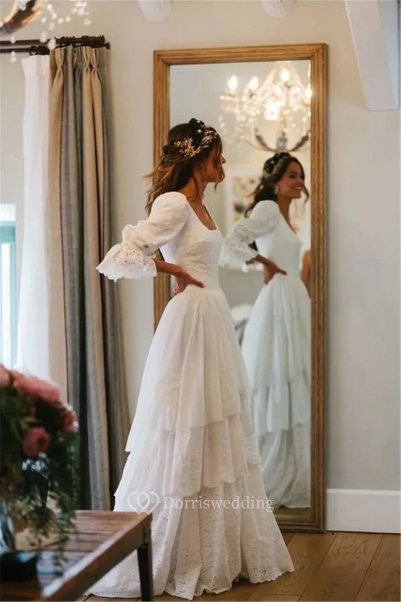 Boho-Hochzeitskleid mit Puffärmeln und gestufter Lochstickerei