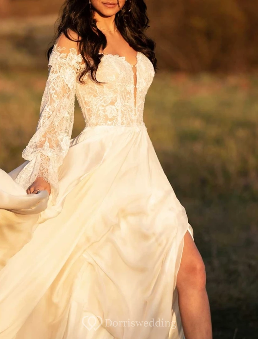 Vestido de novia bohemio de gasa con hombros descubiertos y mangas acampanadas. view 2