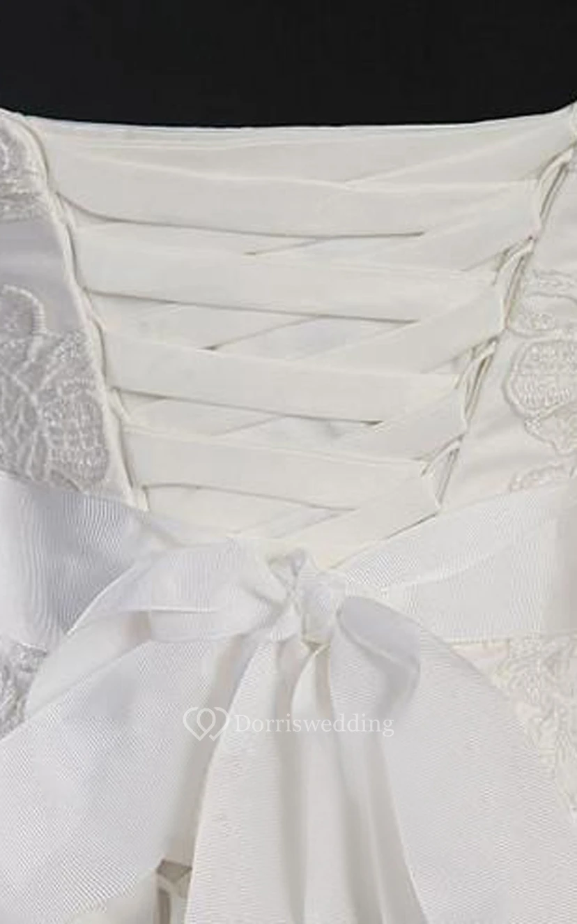 Vestido de encaje y organza sin mangas con tirantes hasta el suelo y estilo corsé. view 2