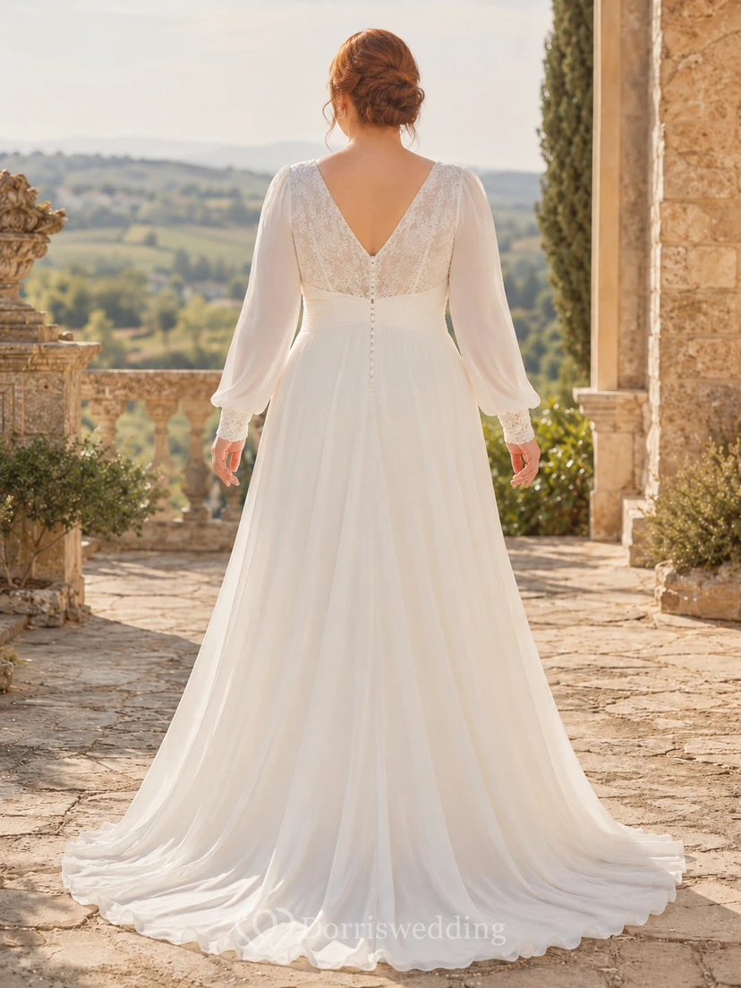 Robe de mariée minimaliste en mousseline, coupe trapèze, col en V, manches longues et traîne. view 2
