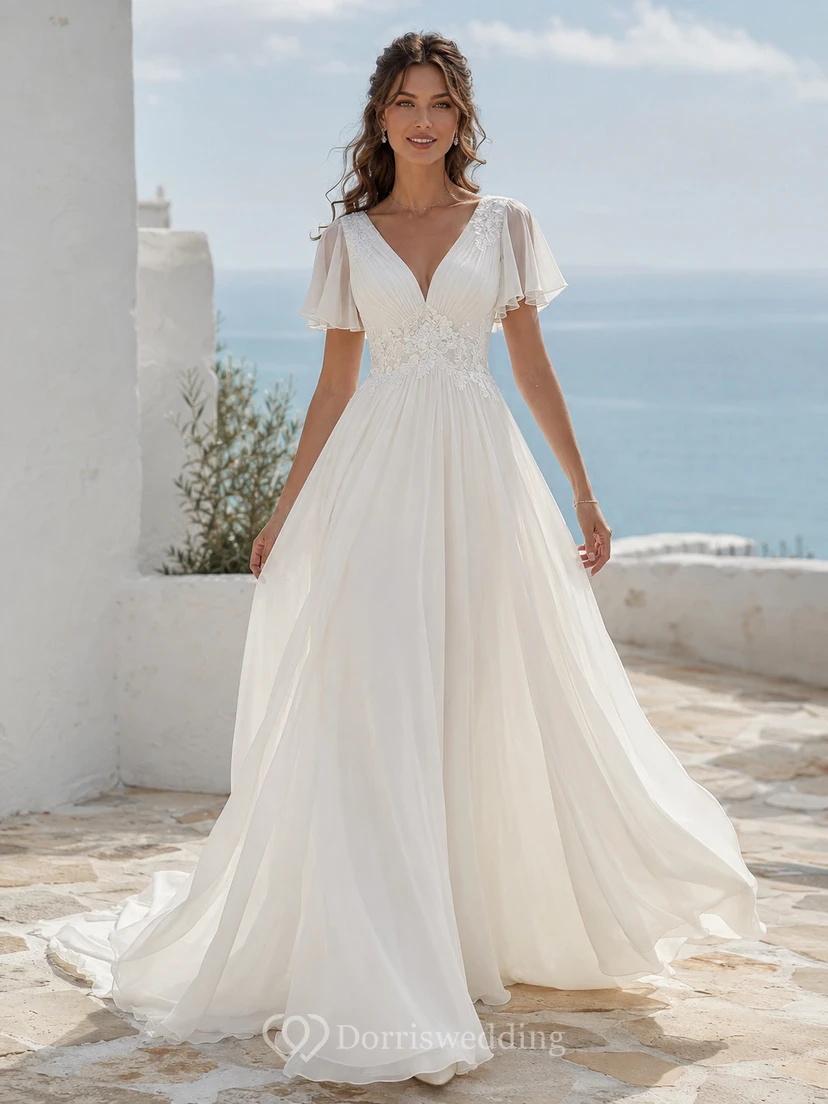 Robe de mariée trapèze en mousseline de soie à manches papillon et décolleté plongeant en V profond