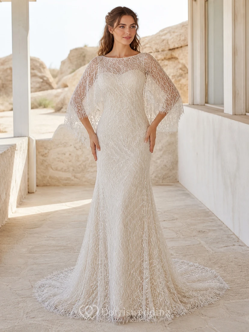Vestido de novia bohemio estilo barco con mangas murciélago y encaje geométrico.