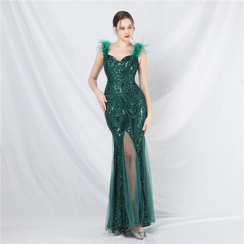 Robe longue haut de gamme en maille à sequins et plumes d'autruche. view 29
