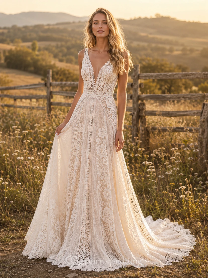 Vestido de novia de tul y encaje campestre, corte en A, tirantes finos, cola capilla, espalda baja en V.