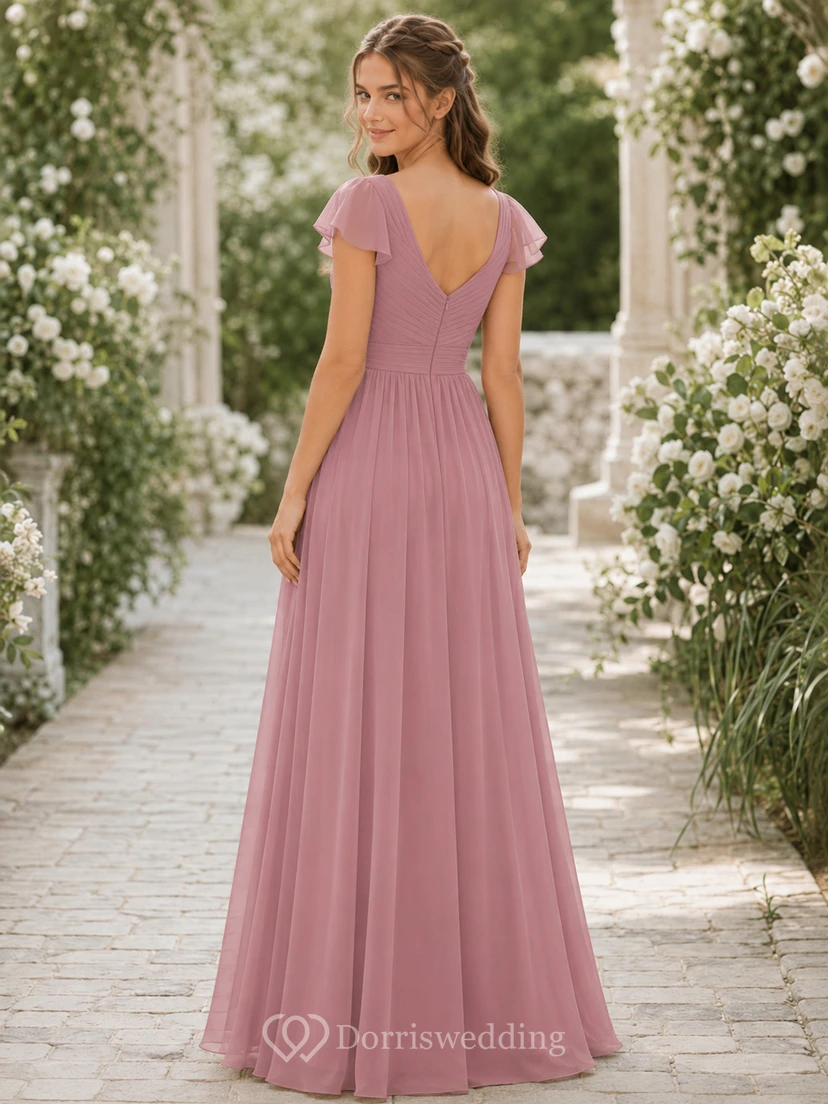 Robe de demoiselle d'honneur junior en mousseline rose poudré à manches papillon view 2