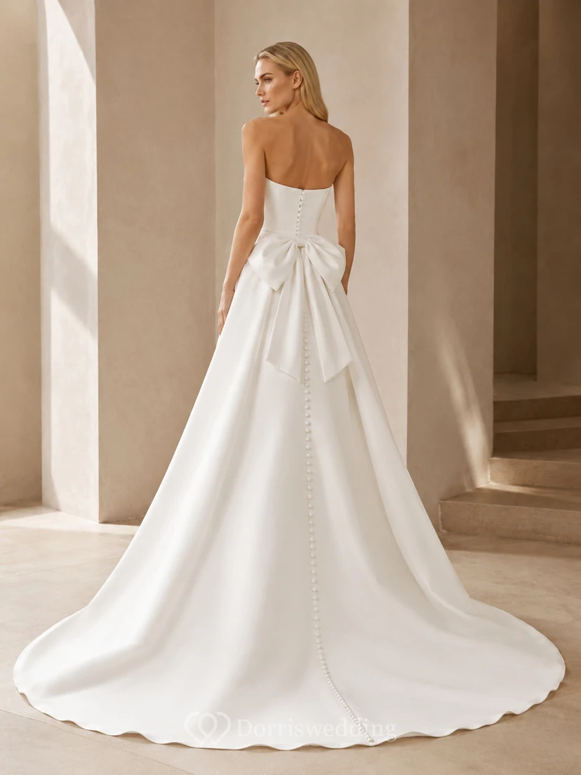Trägerloses Brautkleid aus Satin mit Schleife, A-Linie, modernem Faltenrock und Kapellenschleppe view 2
