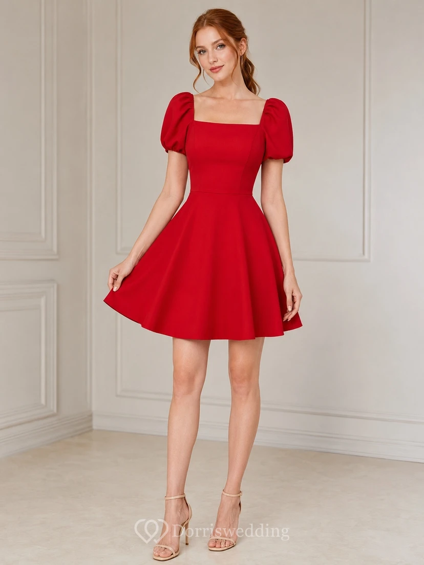 Robe de cocktail courte rouge élégante à col carré, manches bouffantes et coupe évasée, idéale pour un bal de fin d'année.