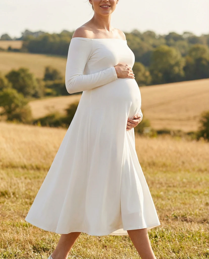 Vestido de novia premamá de manga larga con hombros descubiertos y largo hasta la rodilla en gasa sencilla.
