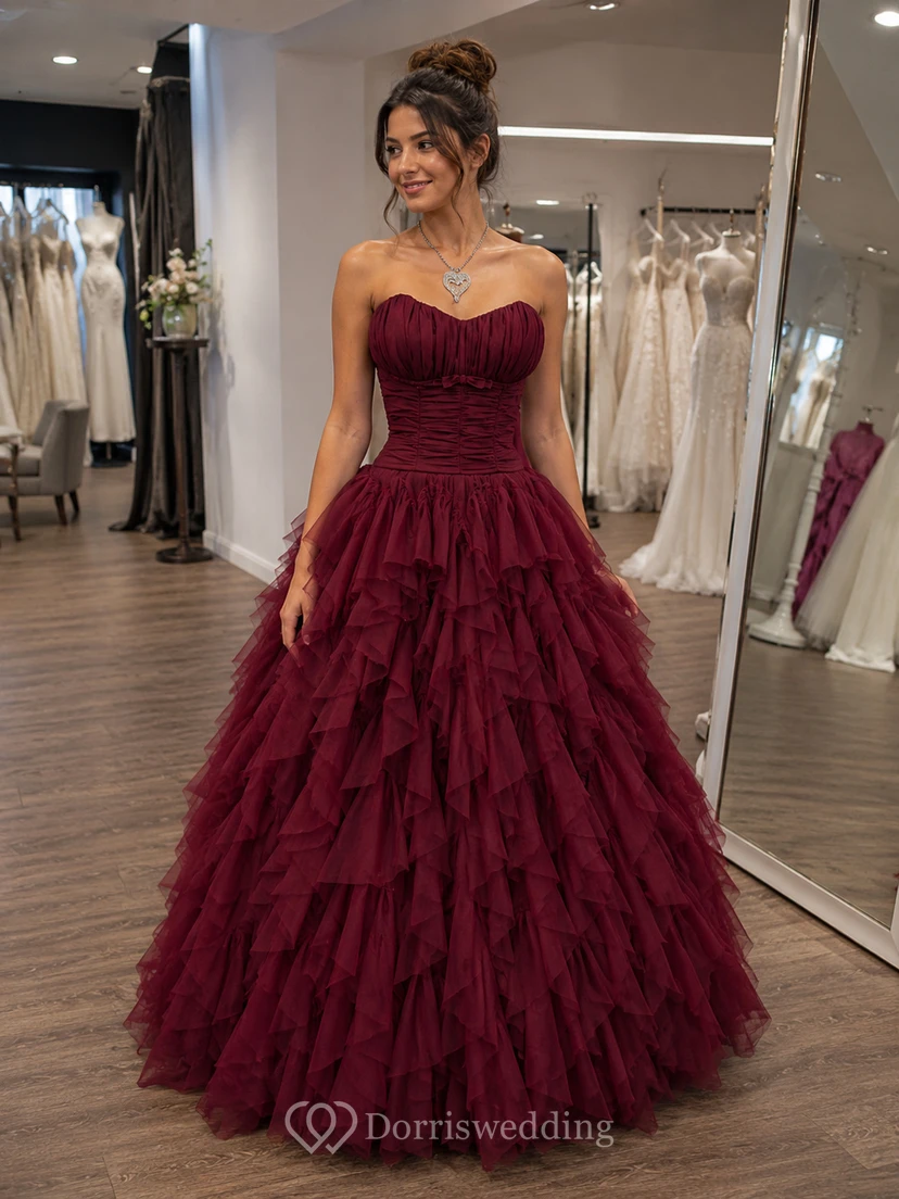 Precioso vestido de fiesta de tul con escote corazón y volantes hasta el suelo. view 8