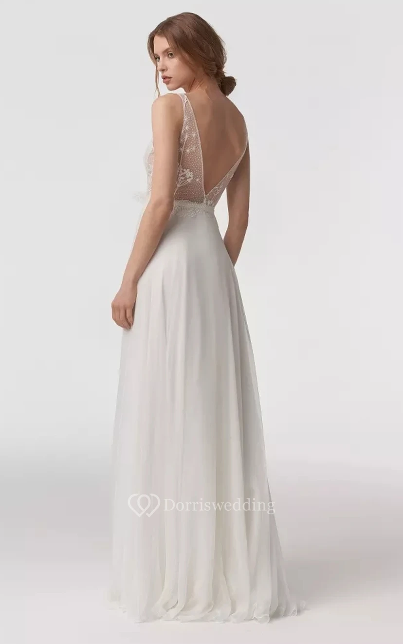 Robe de mariée simple en mousseline de soie, coupe empire fourreau, décolleté en V profond, sans manches, ornée d'un nœud et d'un haut en dentelle. view 2