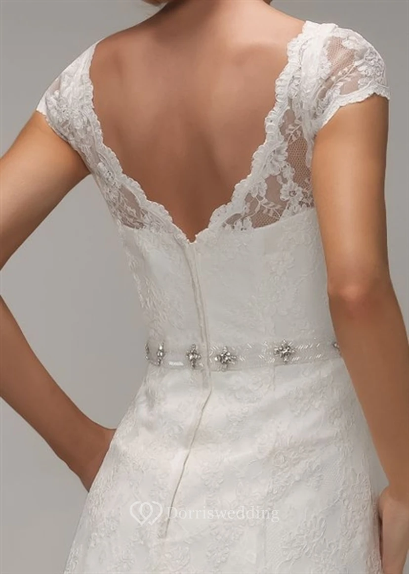 Vestido de novia de corte A con escote en V, mangas cortas, encaje con pedrería, apliques y espalda en V. view 4
