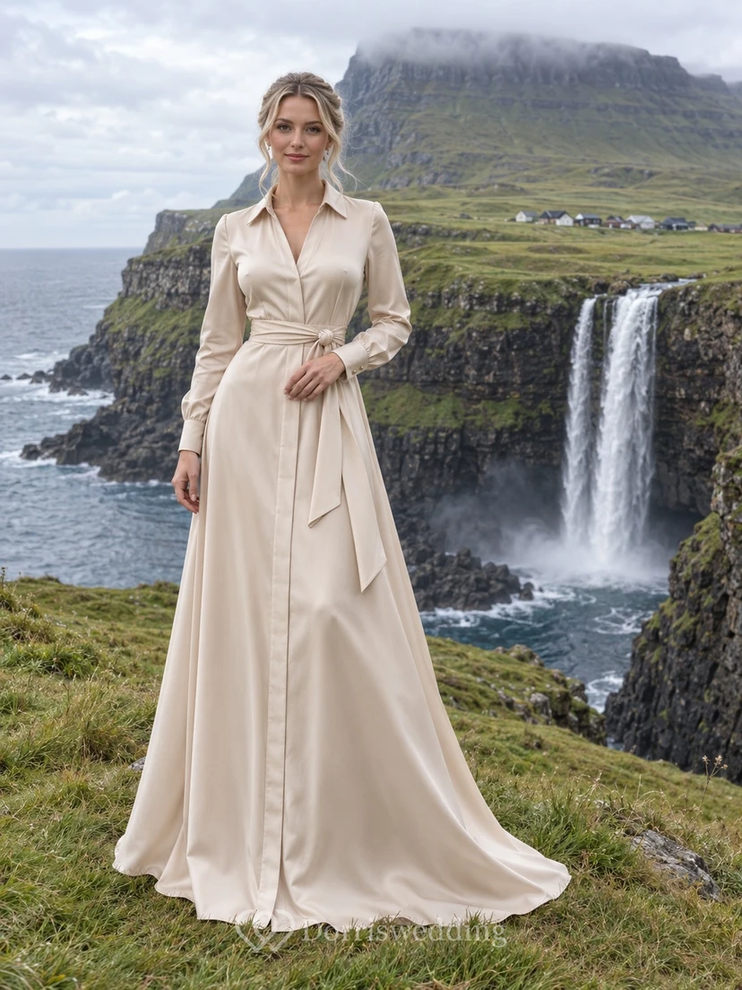 Vestido camisero de novia de satén color beige nude de manga larga con cinturón ajustable.