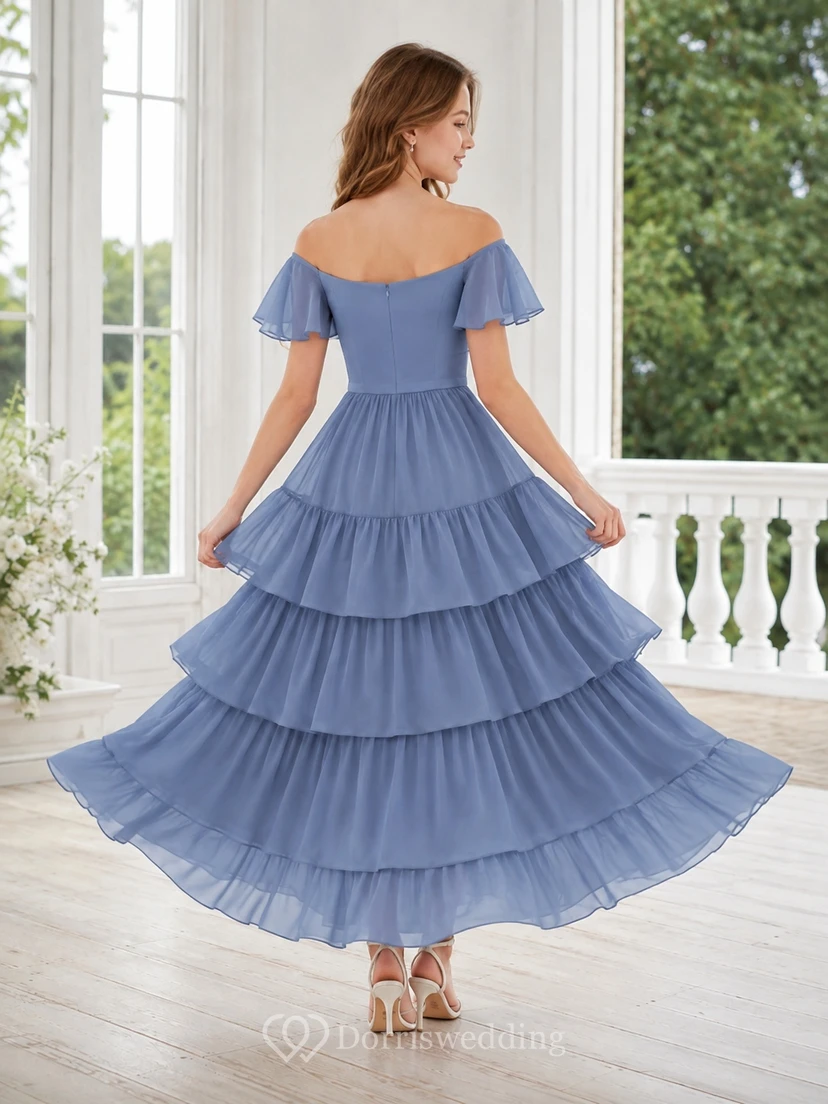 Vestido de dama de honor juvenil azul acero, corte en A, sin mangas, falda escalonada de gasa, romántico. view 2