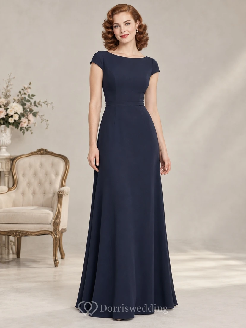 Vestido de invitada largo hasta el suelo de satén azul marino con detalles de joyas y mangas cortas.