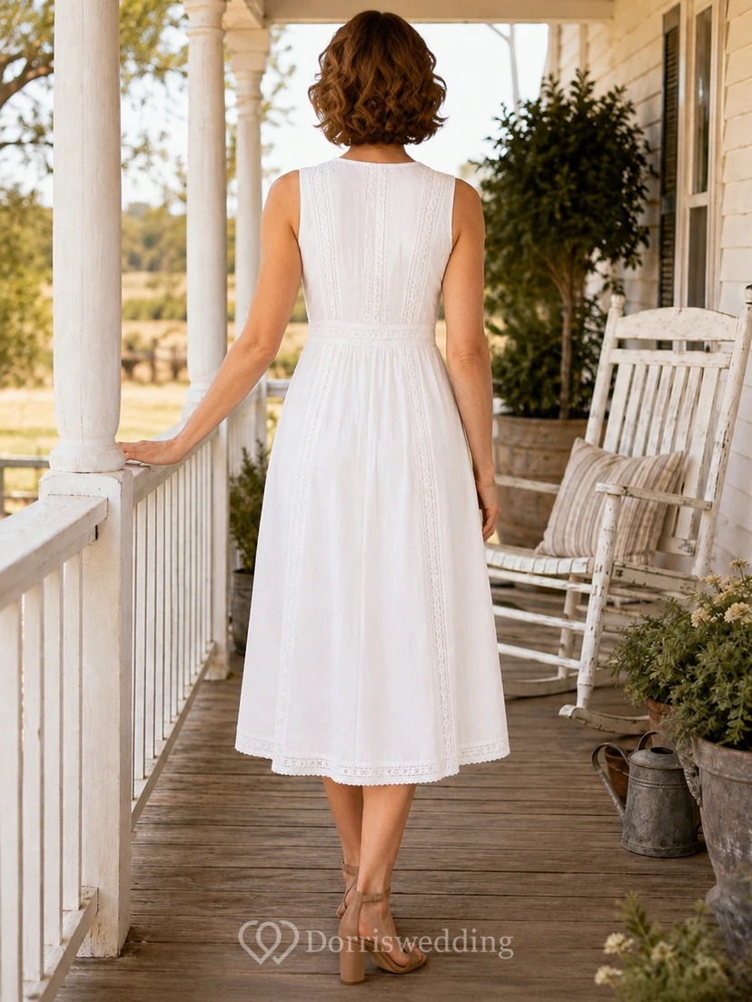 Vestido de campo blanco sin mangas con tirantes y escote en V, largo hasta la rodilla, ideal para invitadas. view 2