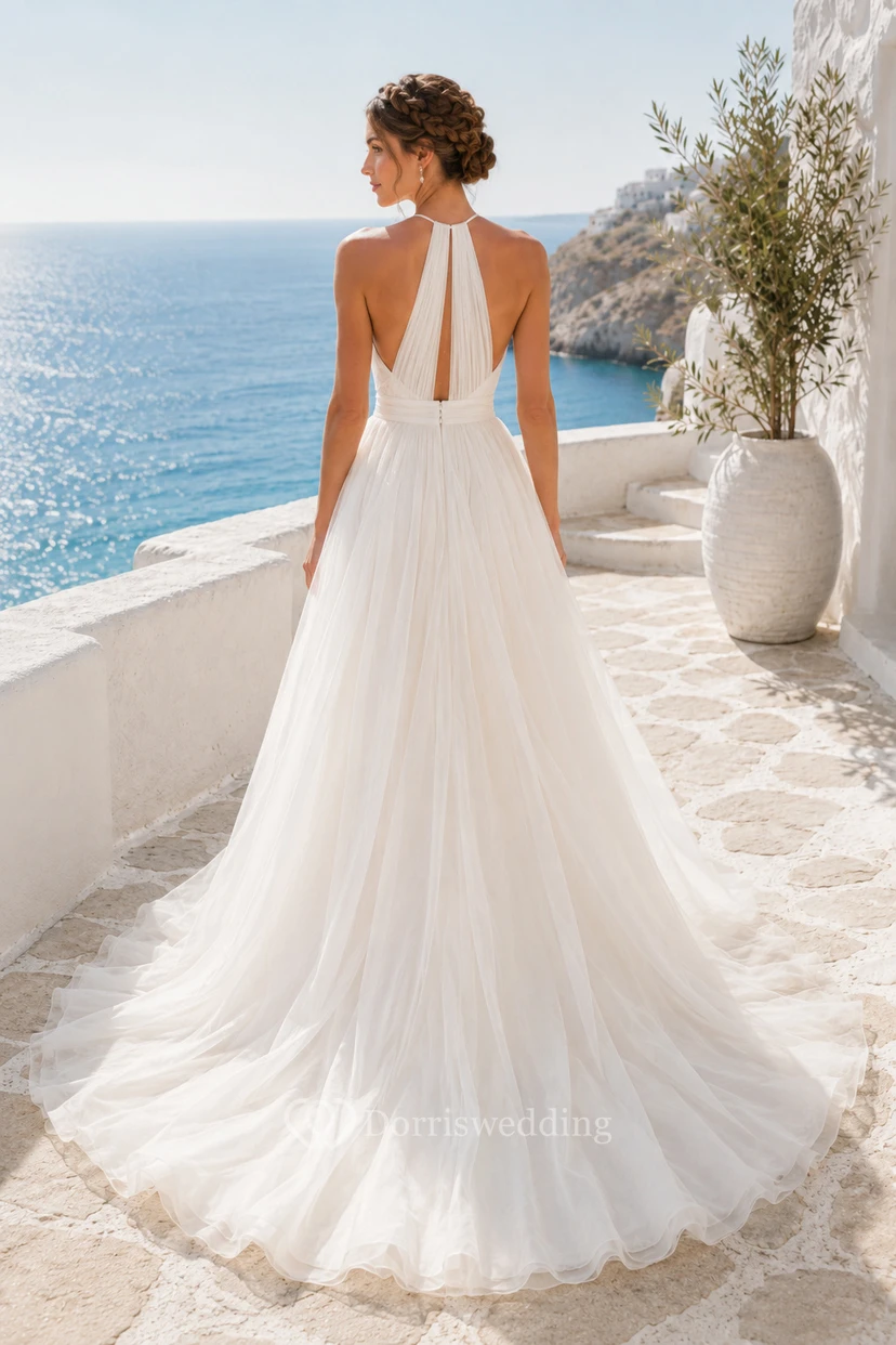 Vestido de novia de tul con escote halter y corte en A con abertura view 2