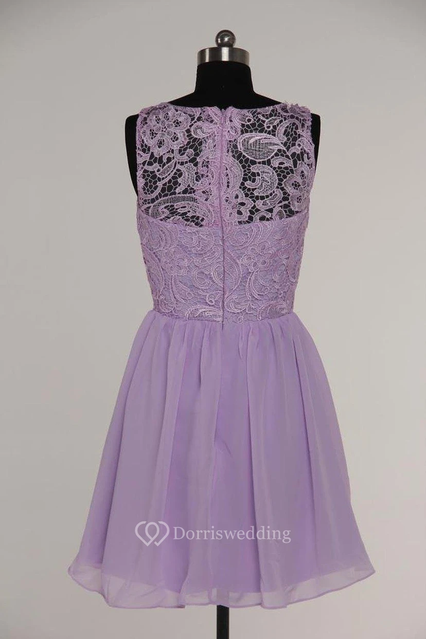 Precioso vestido corto de cóctel sin mangas de gasa con efecto ilusión y encaje. view 2