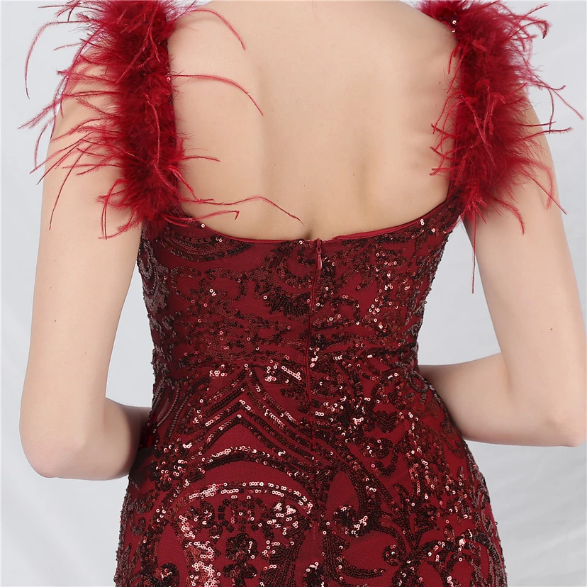 Robe longue haut de gamme en maille à sequins et plumes d'autruche. view 7