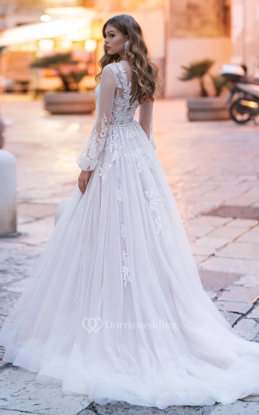 Elegante vestido de novia de corte A con escote en V, encaje y cola, con apliques. view 2