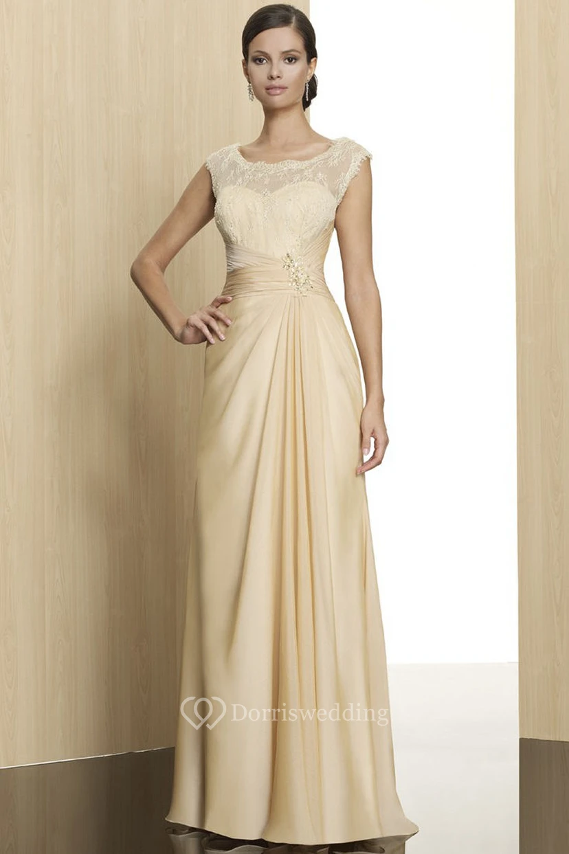 Robe de soirée maxi sans manches en jersey à encolure ronde et dos nu en V, ornée d'appliqués.