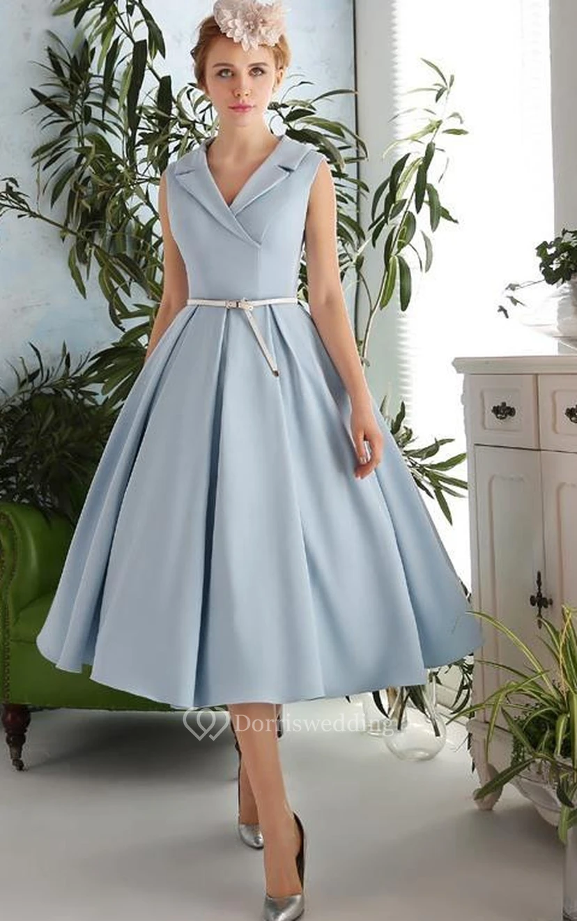 Vestido de fiesta de corte A, escote en V, fajín y largo hasta la rodilla