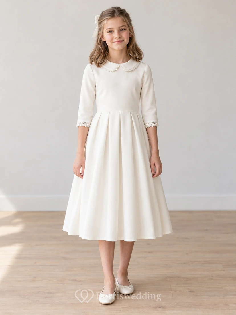 Robe de demoiselle d'honneur vintage ivoire, longueur thé, col rond, bordure en dentelle à boucles, manches trois-quarts à poignets festonnés, taille naturelle à larges plis et fermeture éclair au dos