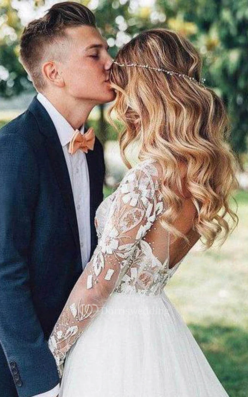 Vestido de novia de gasa con mangas largas y escote en la espalda. view 6