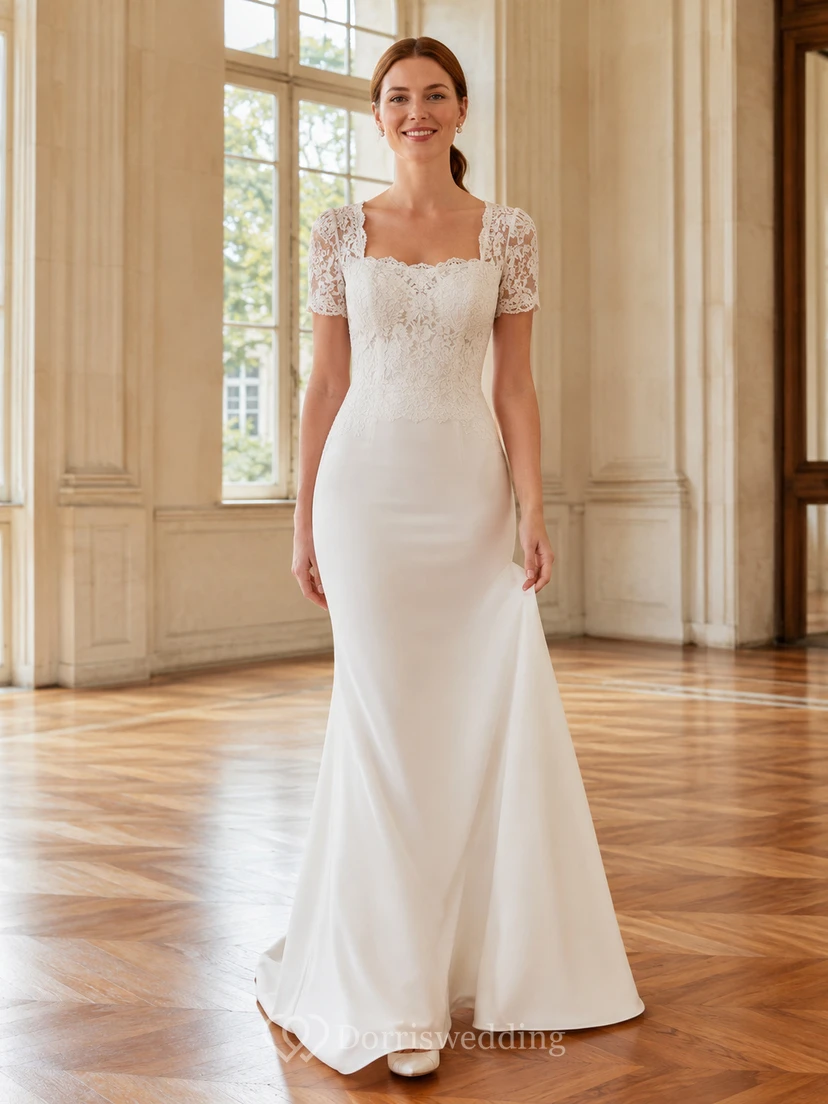 Vestido civil de crepé estilo sirena con escote redondo, mangas cortas y encaje.