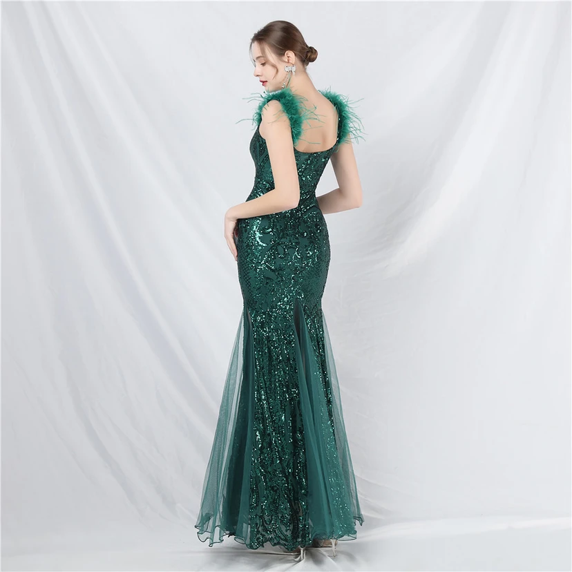 Robe longue haut de gamme en maille à sequins et plumes d'autruche. view 33