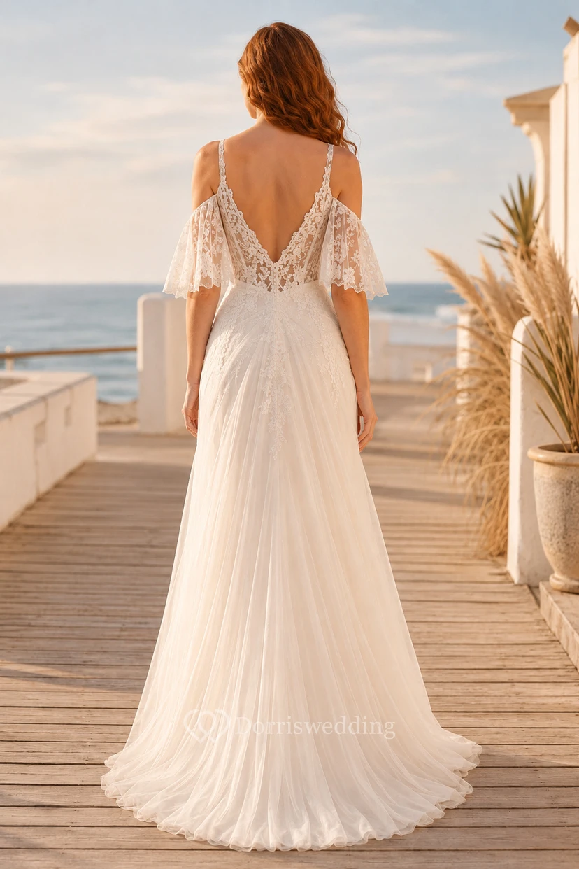 Vestido de novia de tul y encaje playero, corte en A, escote en V, manga corta, largo hasta el suelo, espalda baja en V. view 2