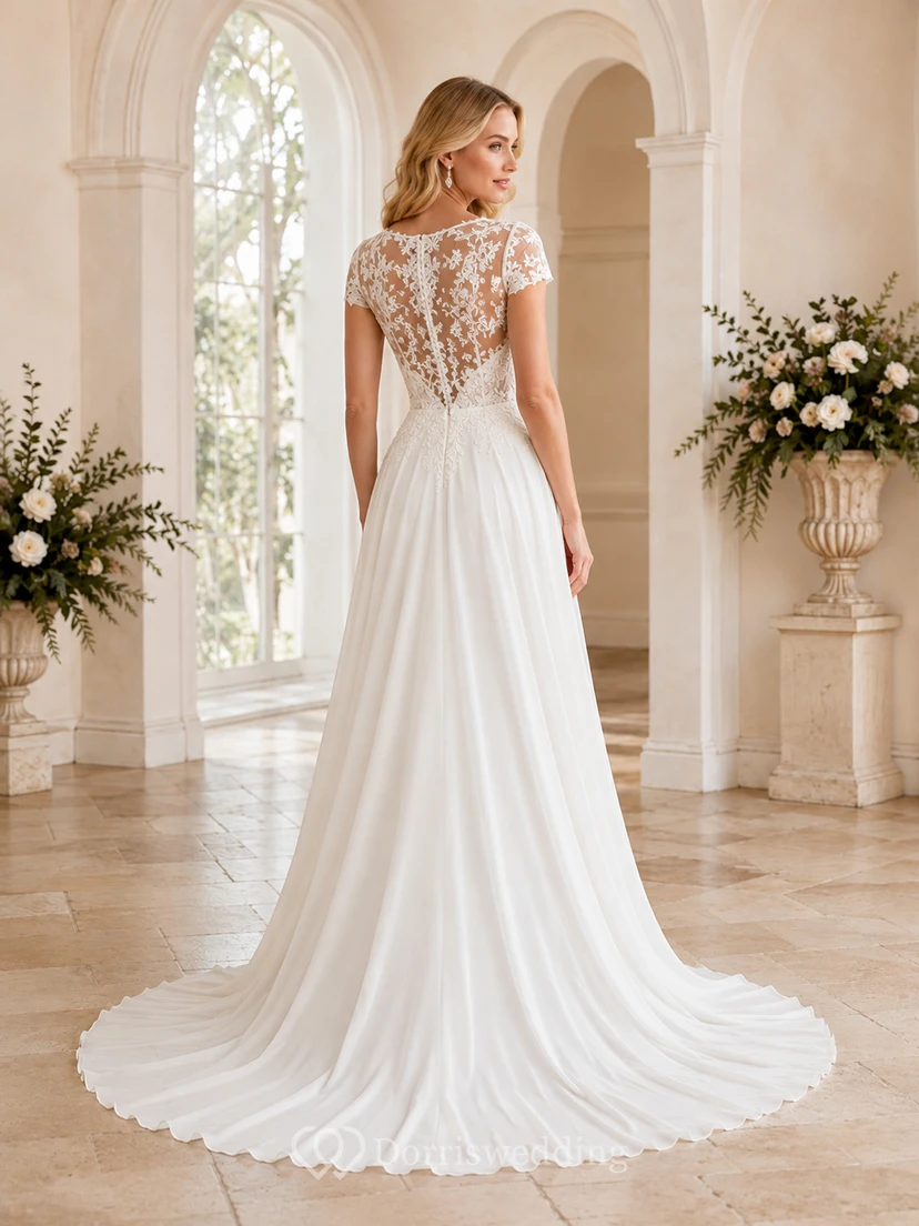 Robe de mariée élégante en dentelle et mousseline, longue jusqu'au sol, col en V, manches courtes et romantique. view 2