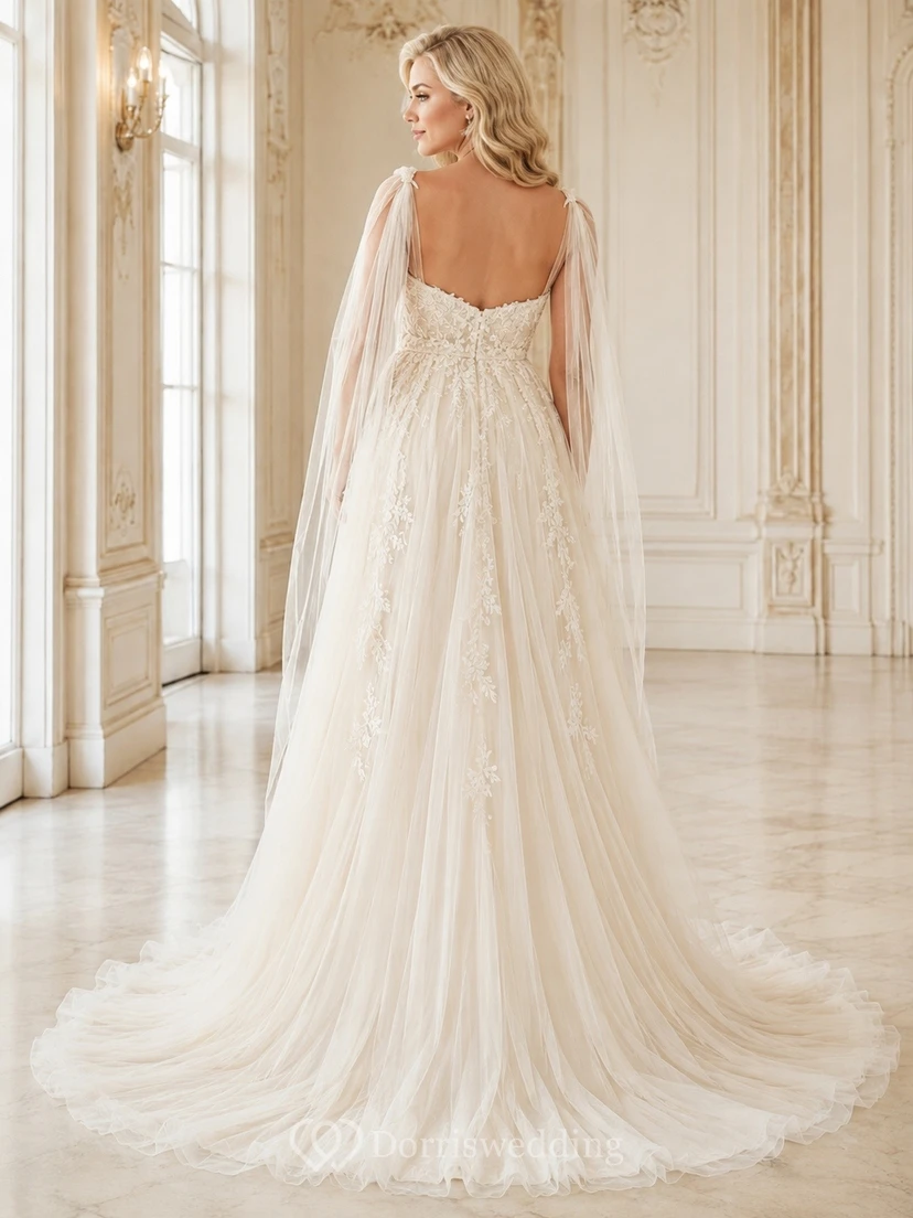 Vestido de novia premamá romántico de corte A con mangas tipo capa y encaje y tul view 2
