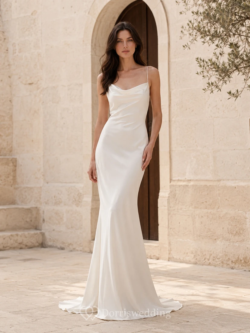 Vestido de novia moderno de satén, asimétrico, sin mangas, corte recto, con drapeado elegante.