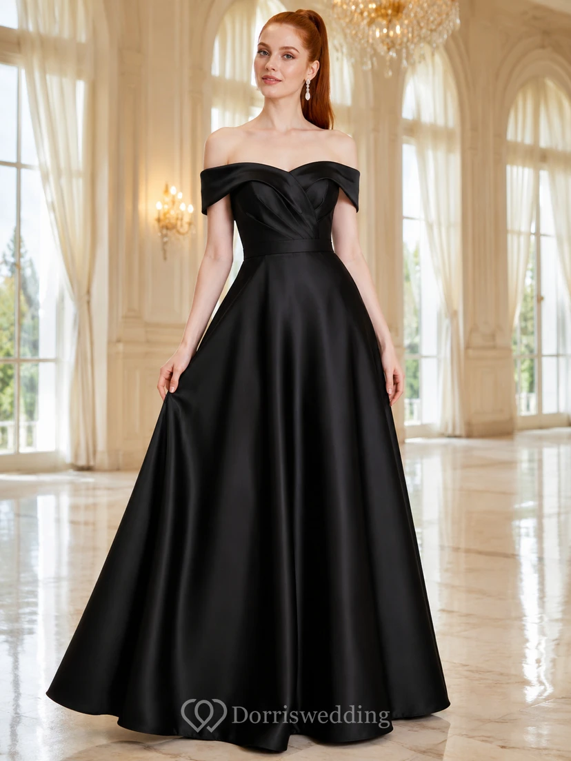 Vestido de gala negro de satén con hombros descubiertos y falda amplia.