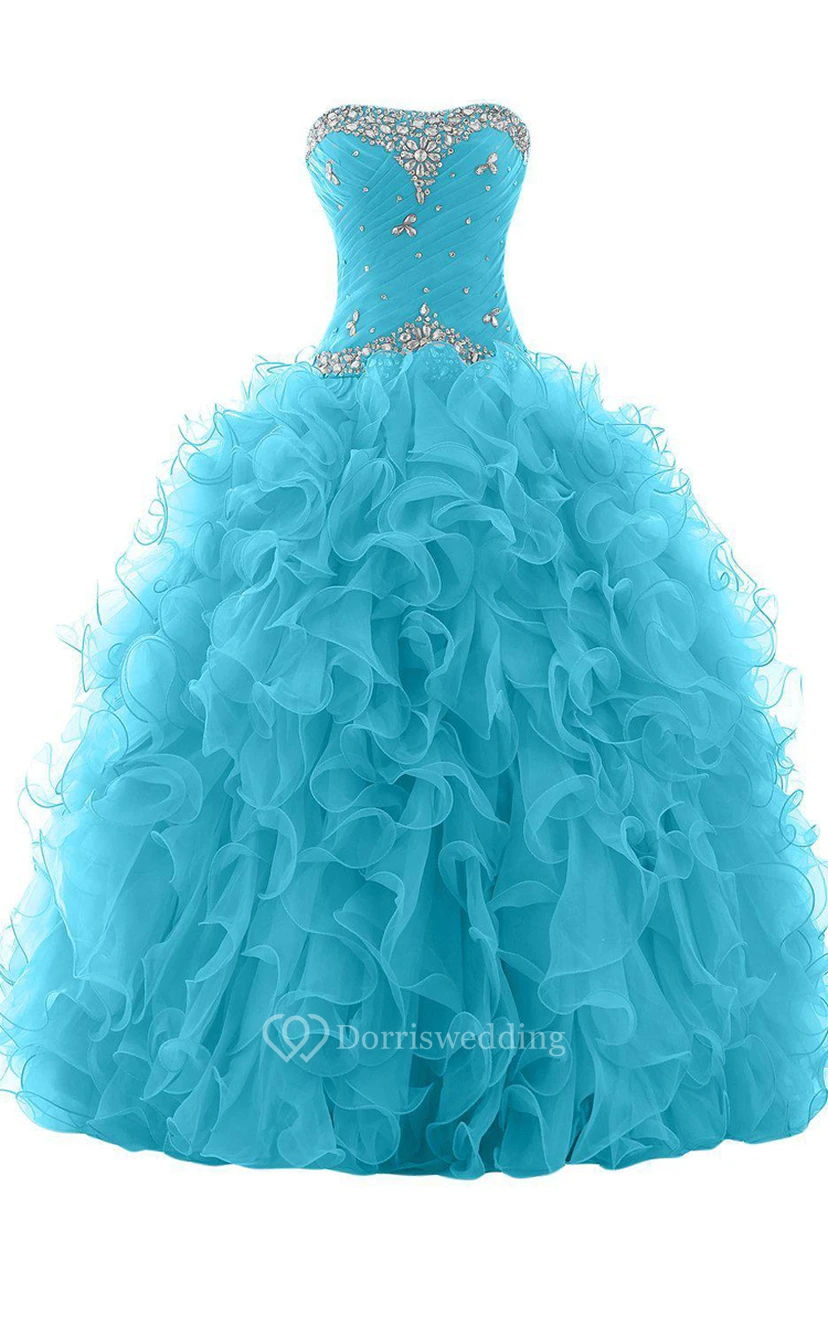 Lujoso vestido de gala de organza con pedrería.