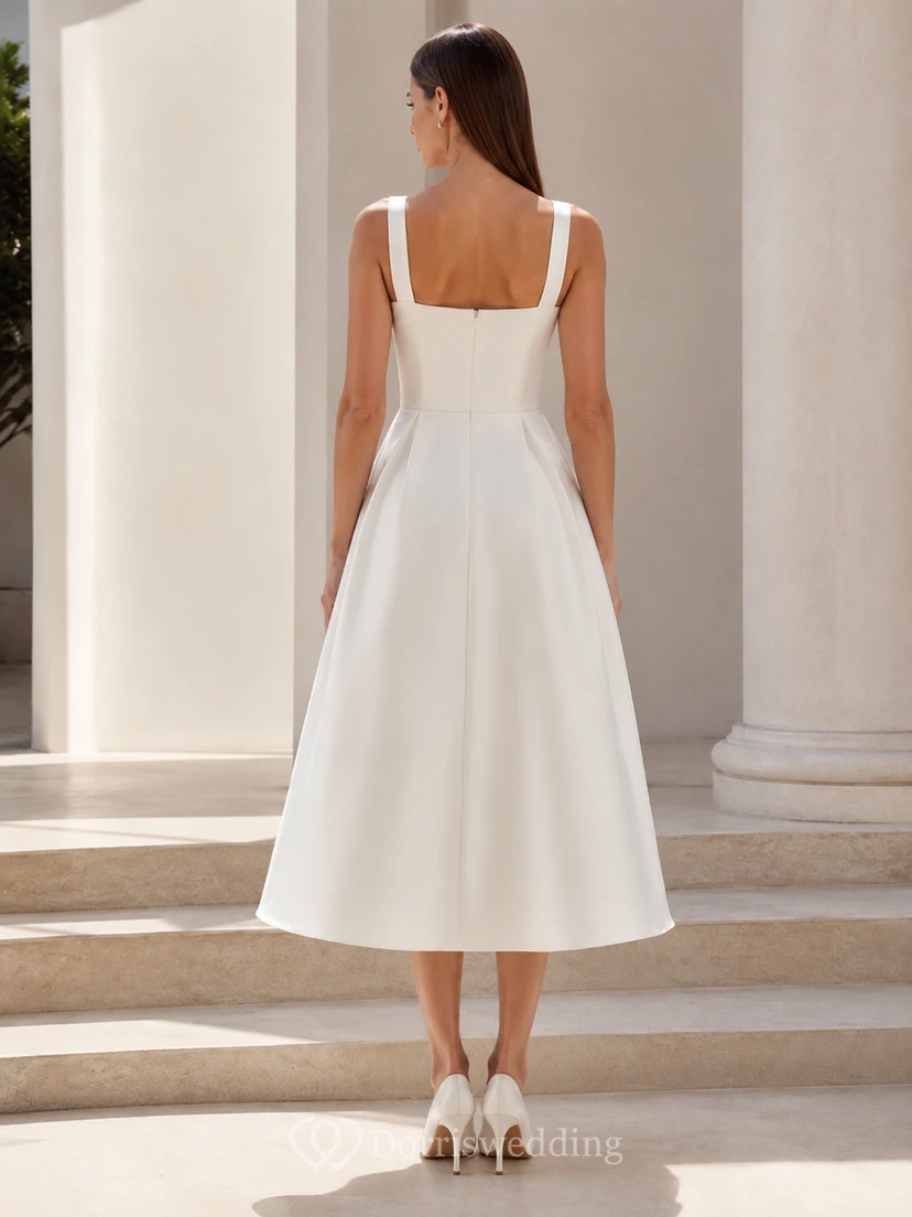 Vestido de novia civil moderno, sencillo, de satén, con tirantes cuadrados y corte en A, largo hasta la rodilla. view 2