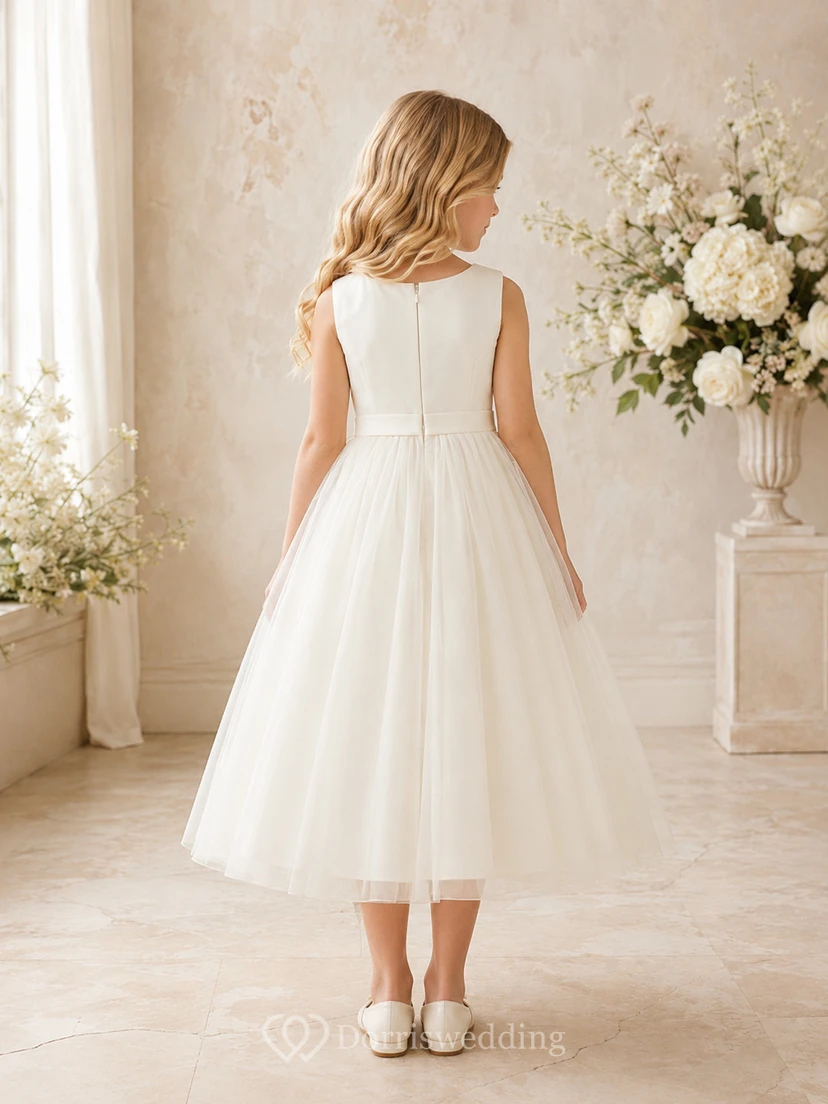 Vestido blanco sencillo de satén con corte en A para niña, sin mangas, escote redondo, largo hasta la rodilla. view 2