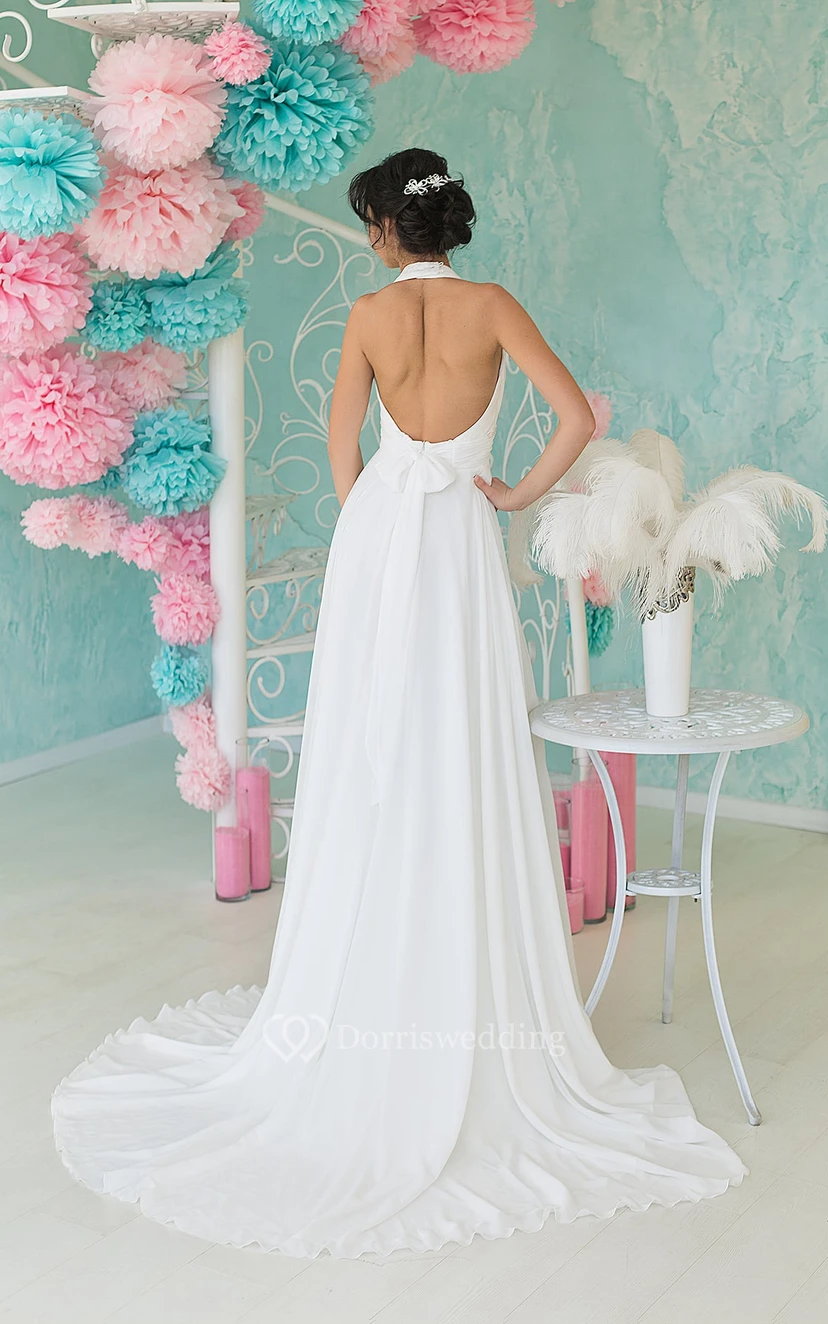 Vestido de gasa sin mangas, con escote halter y espalda descubierta, corte imperio, largo hasta el suelo, con abalorios y fruncido. view 3