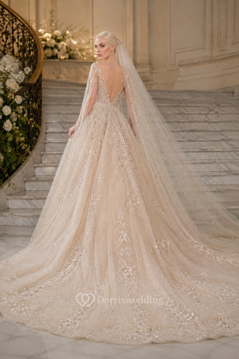 Robe de mariée champagne à manches longues et perles, avec longue traîne. view 2