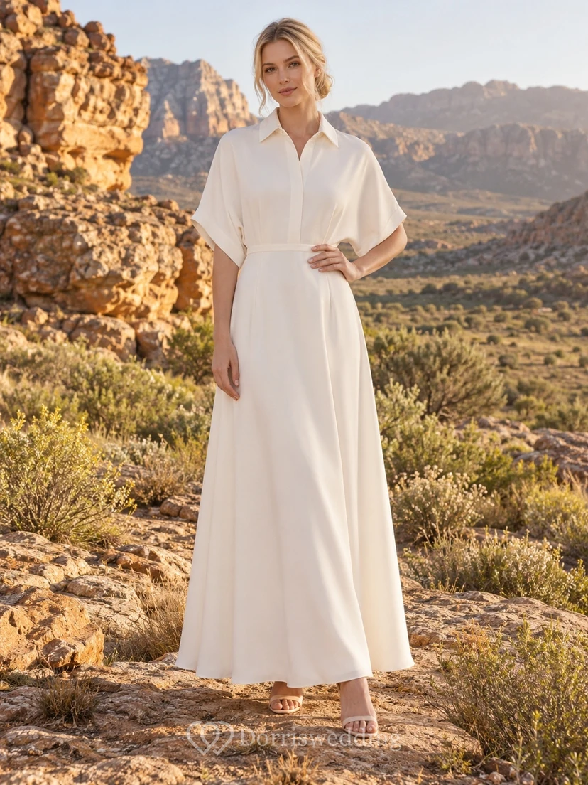 Vestido de novia sencillo e informal de gasa con cuello, manga corta y corte en A, cintura lisa.