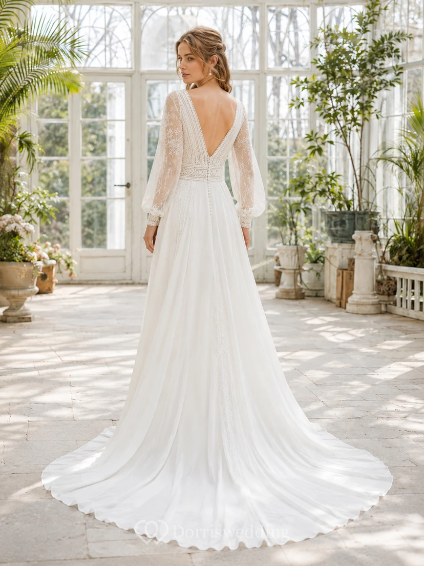 Robe de mariée en mousseline à manches longues, col en V, coupe trapèze, dos nu plongeant et traîne. view 2