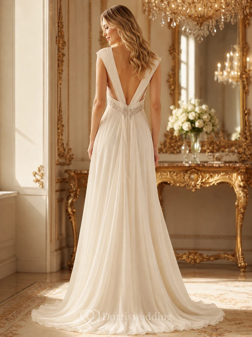 Robe de mariée de plage en mousseline de soie style empire, ornée de perles et de plis, dos nu en V et traîne. view 2