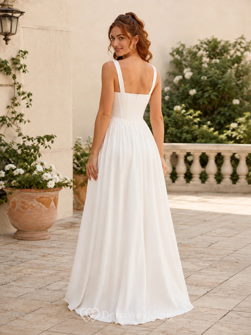 Robe de mariée longue en mousseline, col carré, sans manches, corsage à coutures apparentes, taille naturelle, dos nu à bretelles, coupe trapèze. view 2